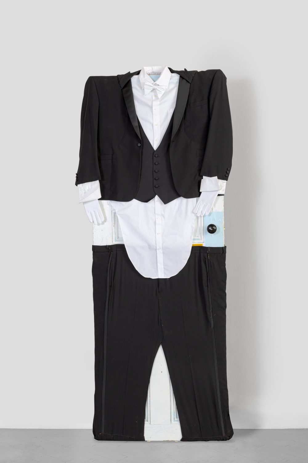 What Lead You to Newfound Innocence, 2021 Suiting, found door 213.4 x 76.2 x 40.6 cm 84 x 30 x 16 in